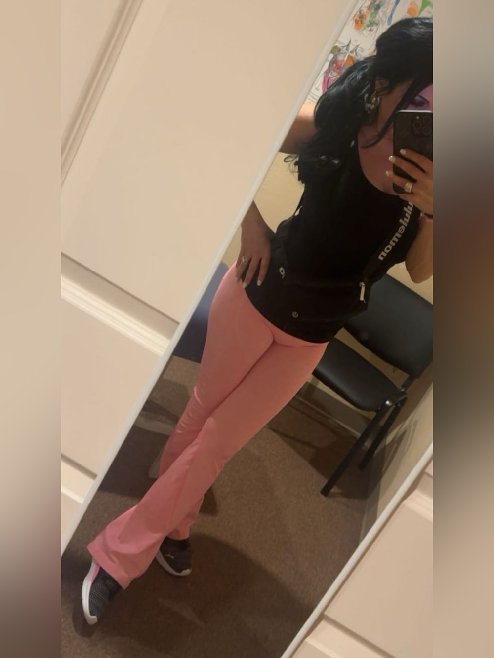Hot pink athletic outfit with Puma sneakers